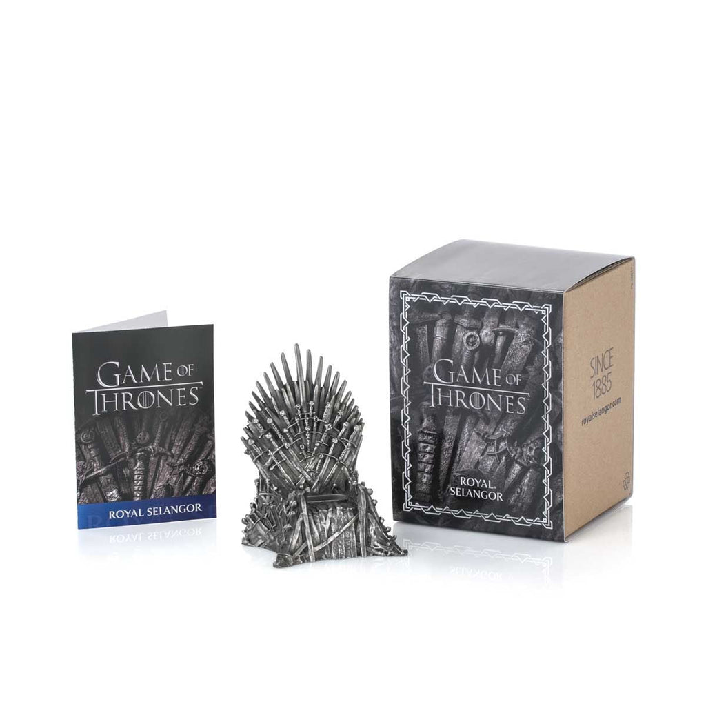 A Game of Thrones Iron Throne Phone Cradle 0160002 with a box next to it.