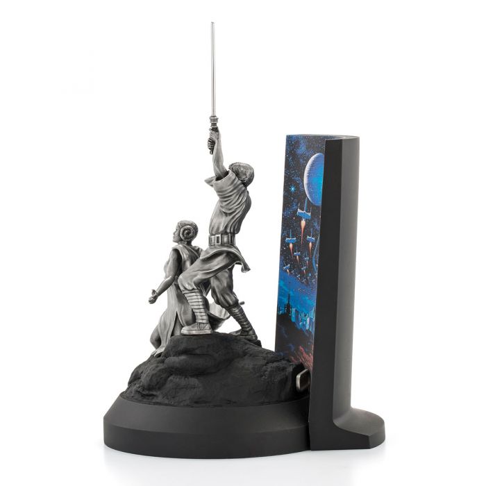 A Star Wars A New Hope Limited Edition Diorama 0179026 with a sword on top of it.