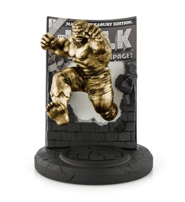 A statue of the Hulk Marvel Treasury Edition Limited Edition Gilt #5 jumping out of a wall.
