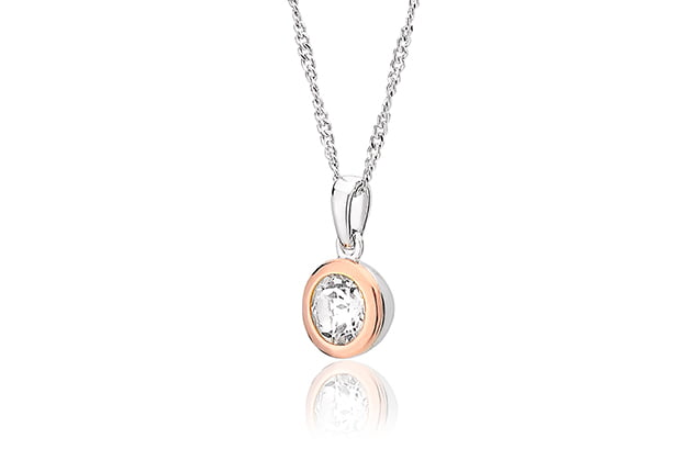 A Clogau® Celebration Pendant 3SMP5 with a diamond in the center.