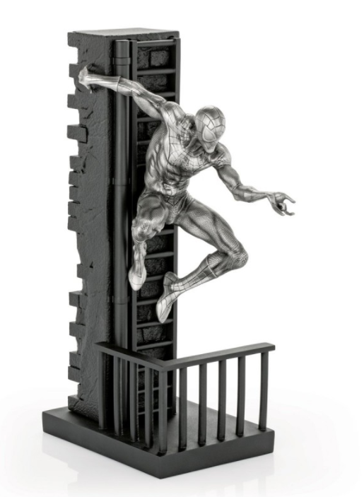 A silver Limited Edition Spider-Man Figurine 017938 jumping out of a window.