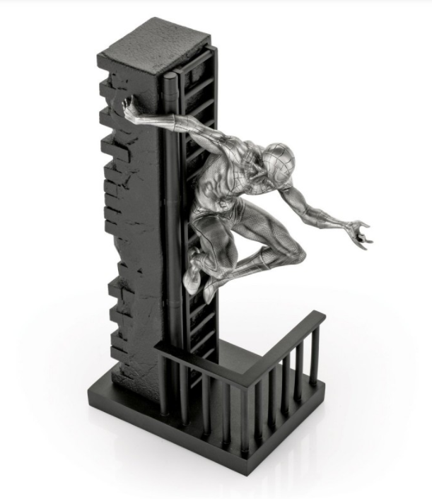 A statue of a Limited Edition Spider-Man Figurine 017938 on a ladder.