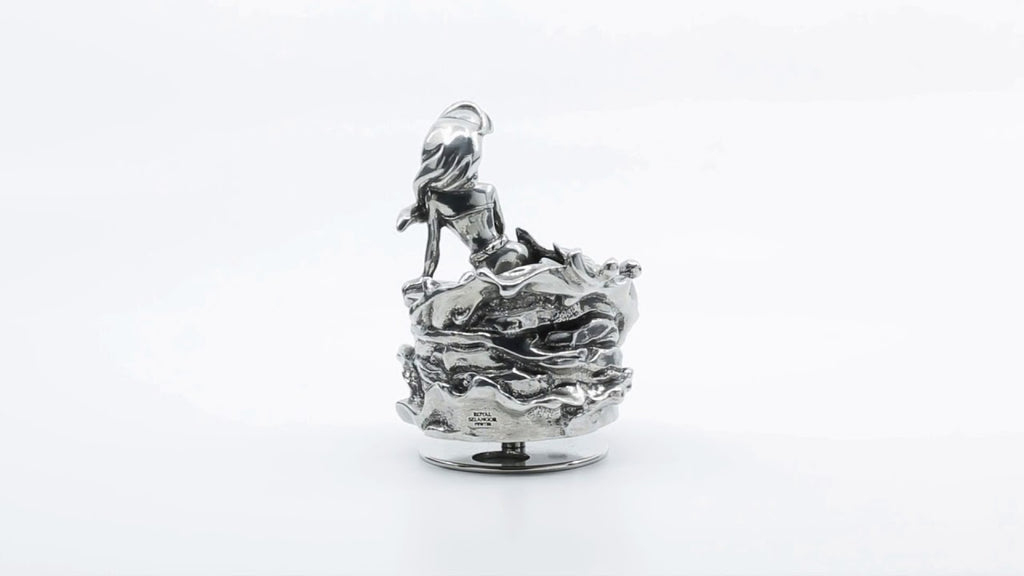 A silver Ariel Music Carousel 016305R sculpture of a horse on top of a white background.