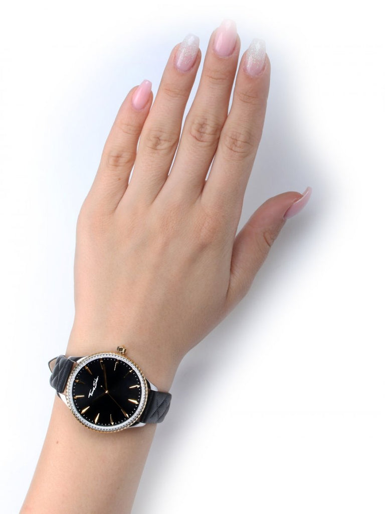 A woman's hand with a Thomas Sabo Watch WA0323-221-203-38MM on it.