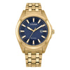 The Citizen Men's Gold Tone Bracelet Watch BM7532-54L features a gold-tone stainless steel case, blue analog dial, gold hour markers, date at 3 o’clock, durable gold link band, and scratch-resistant sapphire crystal.