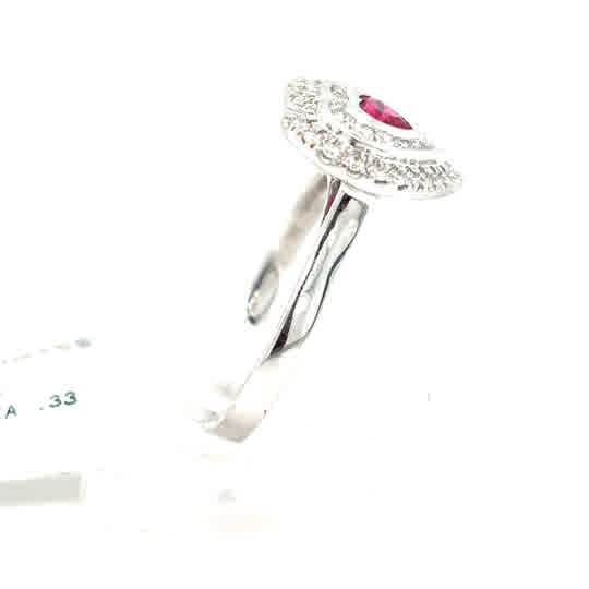 The Ruby & Diamond Heart Cluster Dress Ring in 9ct white gold features a vivid central ruby framed by sparkling diamonds, elegantly displayed on a white background.