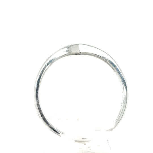 A Ruby & Diamond Wishbone Dress Ring in 9ct white gold stands upright on a white background.