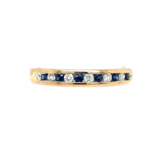 The Sapphire & Diamond Half Eternity Dress Ring in 9ct yellow gold features a single row of alternating blue sapphires and clear diamonds across the band.