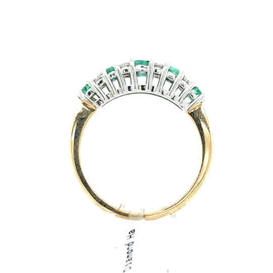 Emerald and Diamond Half Eternity Ring in 9ct yellow gold, featuring a row of green emeralds and sparkling diamonds set on a sleek band—timeless and elegant, perfect for any occasion.