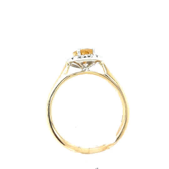 Citrine & Diamond Halo Dress Ring in 9ct yellow gold, featuring a prong-set gemstone, displayed from the side on a plain white background.