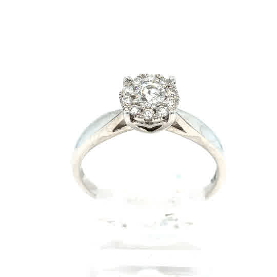 Starburst Canadian Diamond Cluster Ring in 9ct White Gold, featuring a round center diamond surrounded by a halo of ethically-sourced Canadian diamonds, showcased against a plain white background.