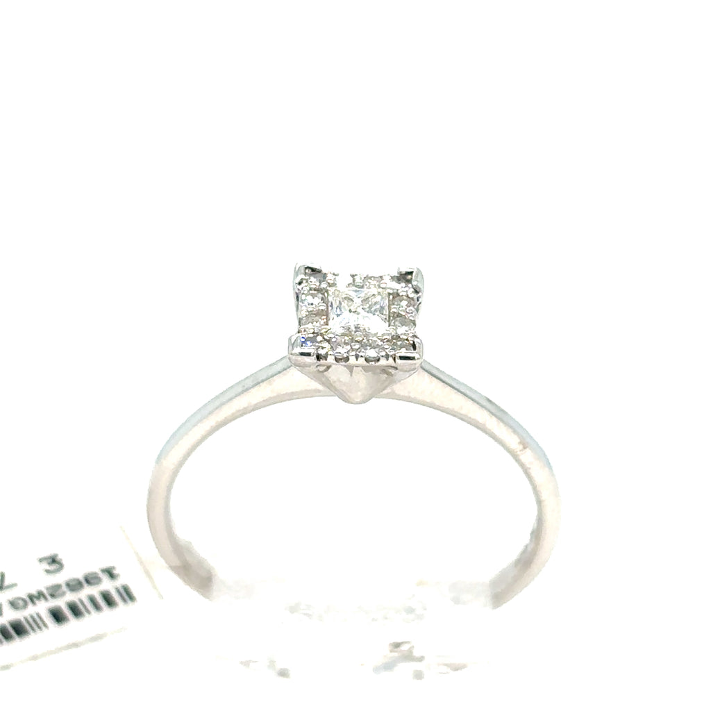 The Starburst Canadian Diamond Princess Cut Engagement Ring in 9ct white gold features a square cluster of four princess cut diamonds on a slim band, shown against a white background.