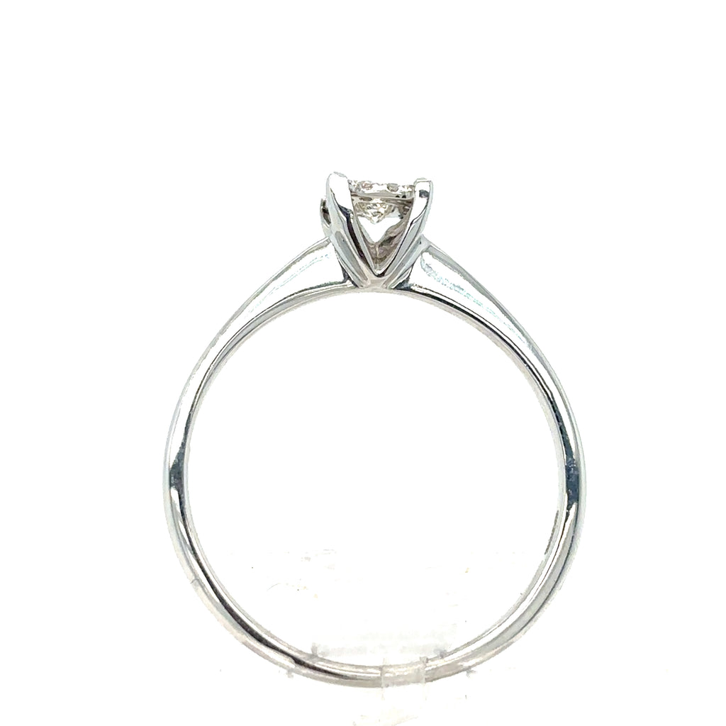 The Starburst Canadian Diamond Princess Cut Engagement Ring in 9ct white gold, featuring a single princess-cut diamond in a modern setting, shown from the side against a white background.