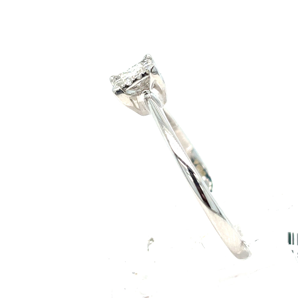 The Starburst Canadian Diamond Princess Cut Engagement Ring in 9ct white gold is showcased on a white background, featuring a single princess-cut diamond in a classic setting.