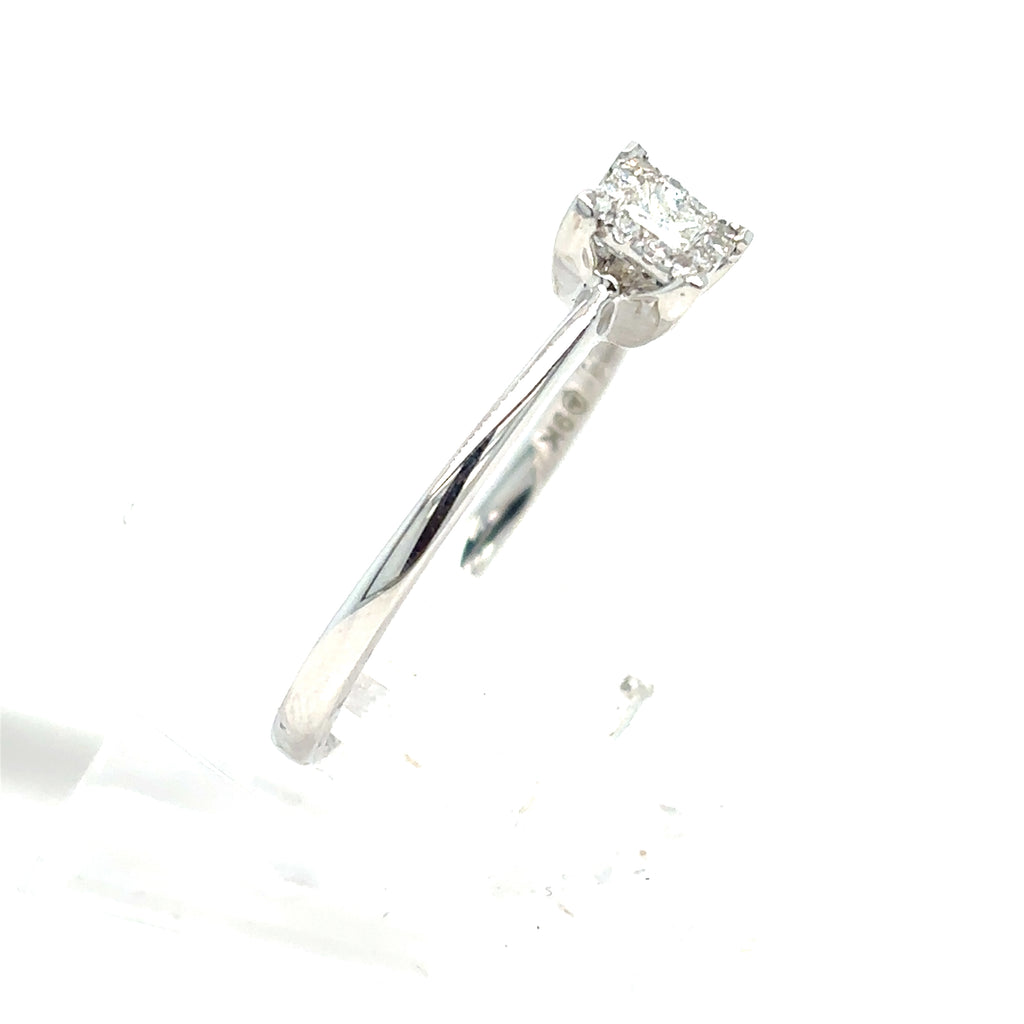 The Starburst Canadian Diamond Princess Cut Engagement Ring in 9ct white gold is shown against a white background.