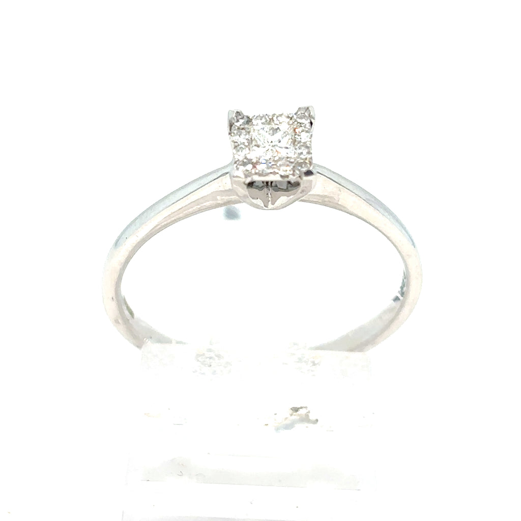 The Starburst Canadian Diamond Princess Cut Engagement Ring in 9ct white gold features a prong-set solitaire diamond, shown against a plain white background.