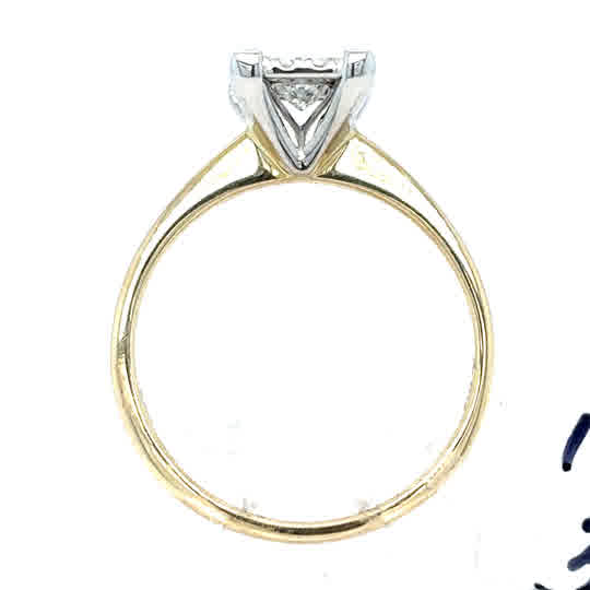 The Starburst Canadian Diamond Princess Cut Cluster Engagement Ring in 9ct yellow gold features a raised prong-style white metal setting, showcasing a clear princess cut diamond from a side view.