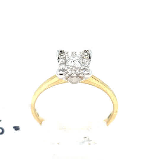 The Starburst Canadian Diamond Princess Cut Cluster Engagement Ring in 9ct yellow gold features a clear diamond cluster in a white metal prong setting, shown on a white background.