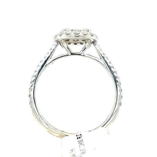 Side view of the Starburst Canadian Diamond Round Engagement Ring in 9ct white gold, showcasing a raised cluster design with small round diamonds on the band and encircling the center stone.