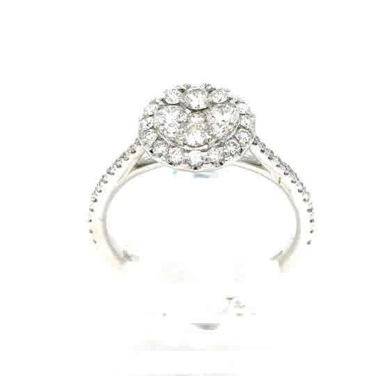 The Starburst Canadian Diamond Round Engagement Ring in 9ct white gold features a sparkling central round cluster with a diamond halo and accents along the band.