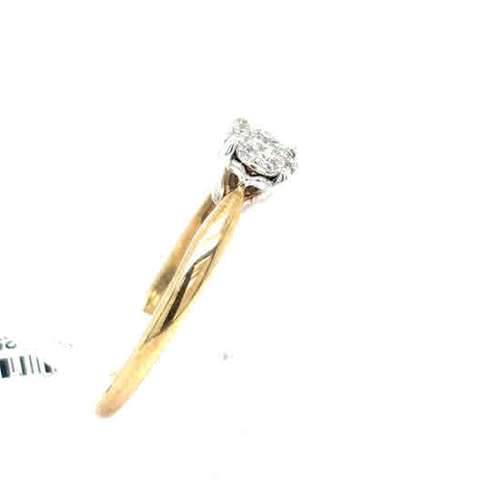 The Starburst Canadian Diamond Cluster Engagement Ring in 9ct yellow gold features sparkling Canadian diamonds set in an elegant cluster design.