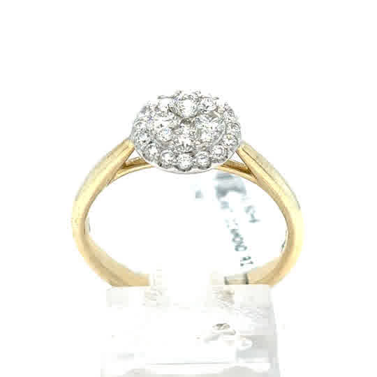 The Starburst Canadian Diamond Round Engagement Ring in 9ct yellow gold features ethically sourced Canadian diamonds in a round cluster setting, shown on a clear stand with a white background.