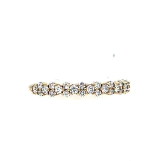 The Starburst Canadian Diamond Half Eternity Ring in 9ct Yellow Gold features a row of round clustered diamonds set across the band.