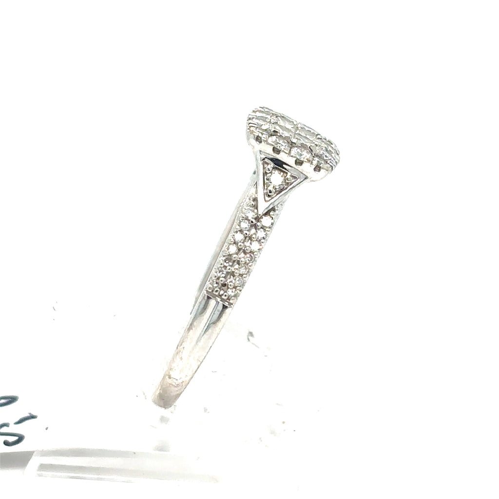 The Pre-loved Diamond Cluster Engagement Ring in 9ct white gold features a square diamond cluster centerpiece and sparkling diamonds along the band.