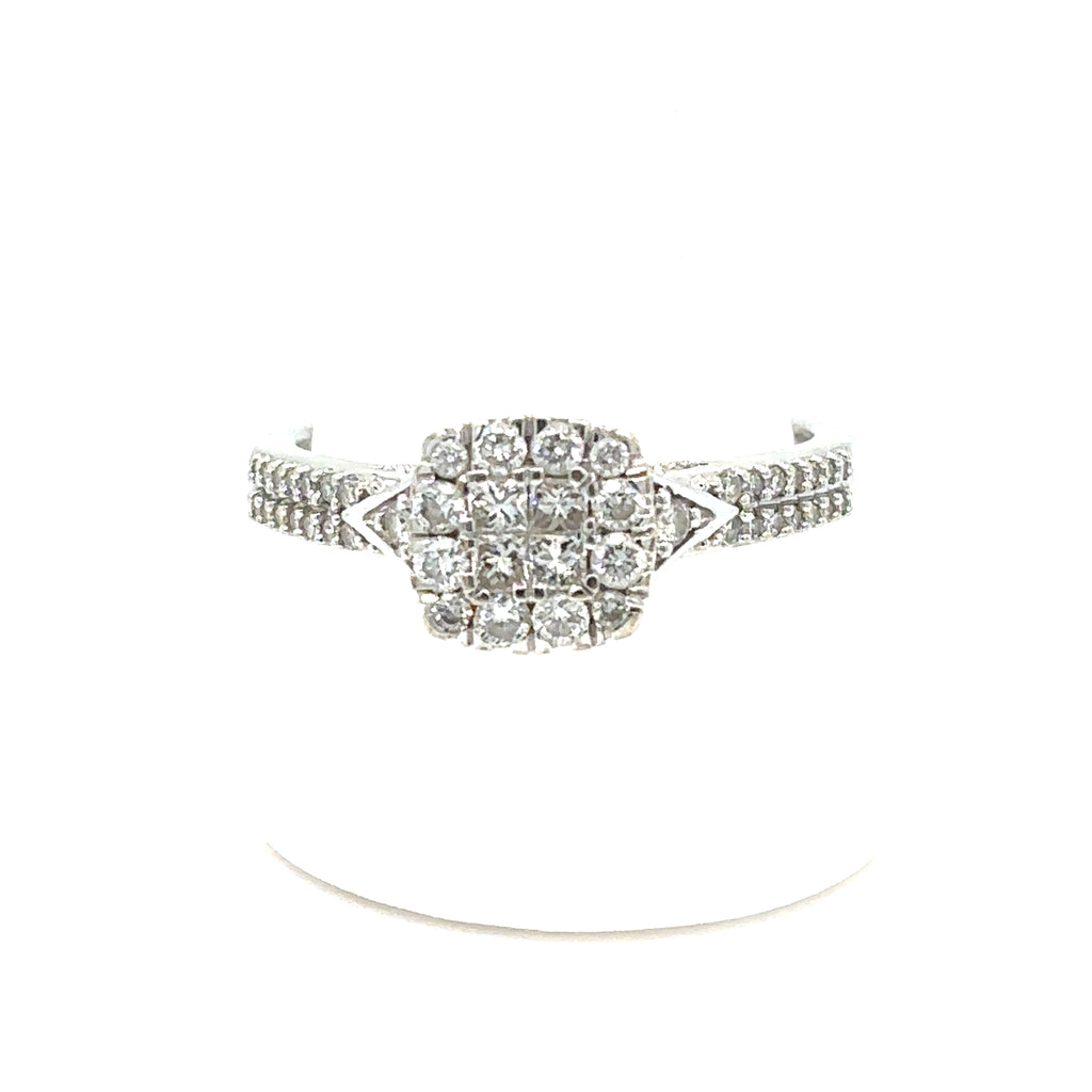 Pre-loved Diamond Cluster Engagement Ring in 9ct white gold, featuring a central diamond cluster and smaller diamonds on the band, shown on a white background.