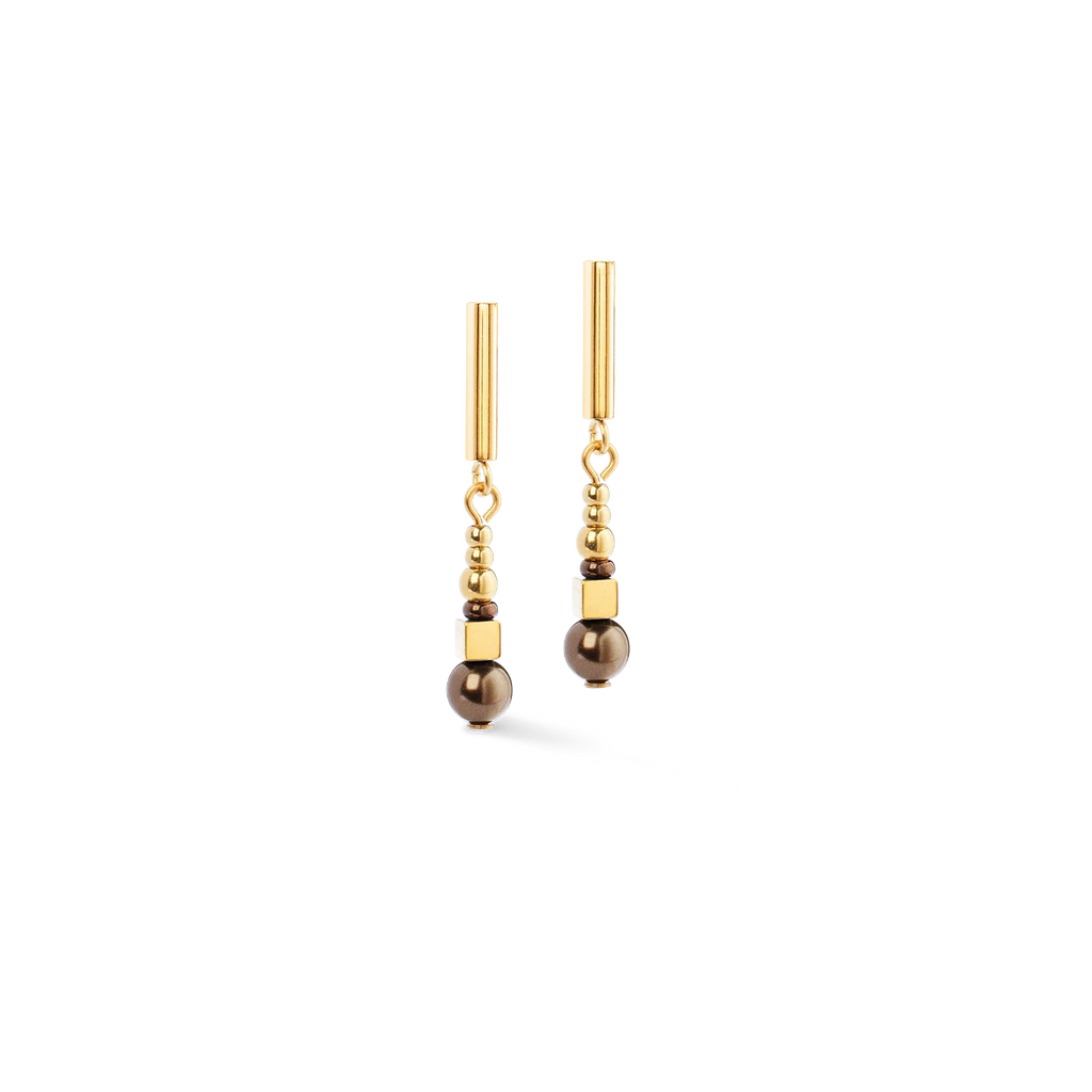 The Coeur De Lion Earrings Shimmering Princess Pearls gold-brown feature gold-plated stainless steel with cylindrical and round beads, finished with a larger dark bead at the bottom, shown on a plain white background.