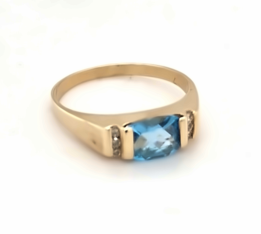 Blue Topaz & Diamond Ring.