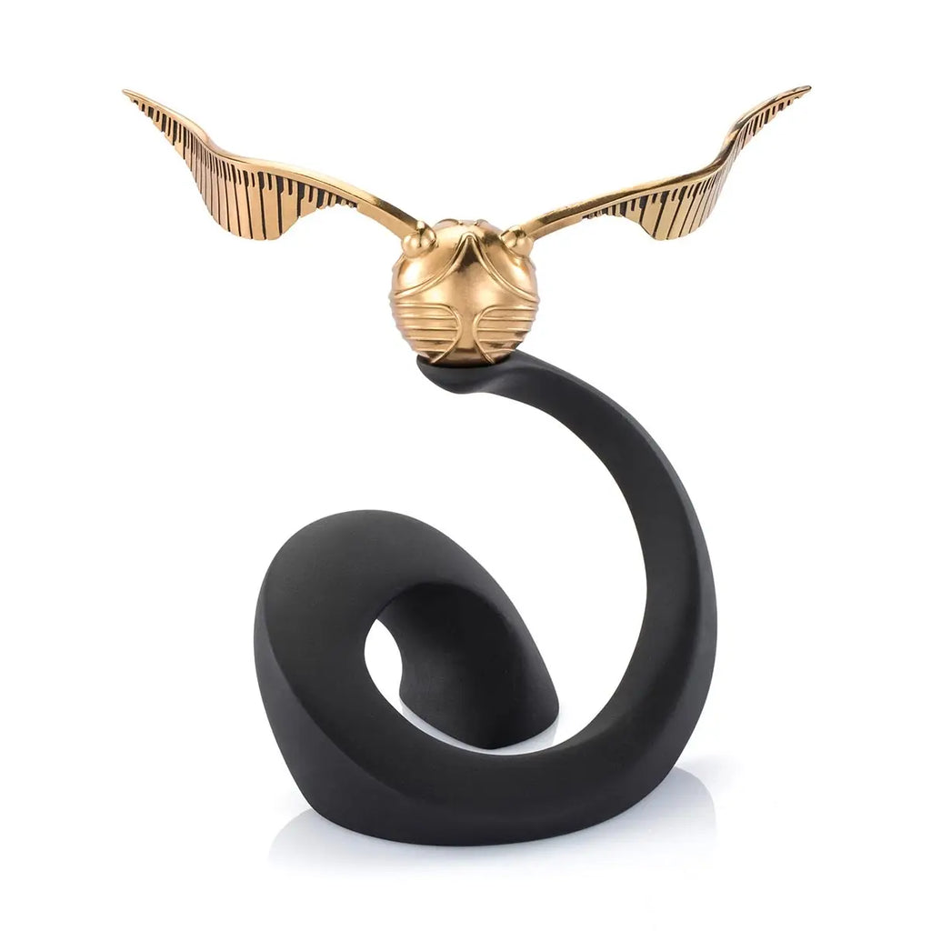The Harry Potter Limited Edition Golden Snitch Replica features a 24K gold snitch atop a sleek, black abstract base—a must-have collectible for fans.