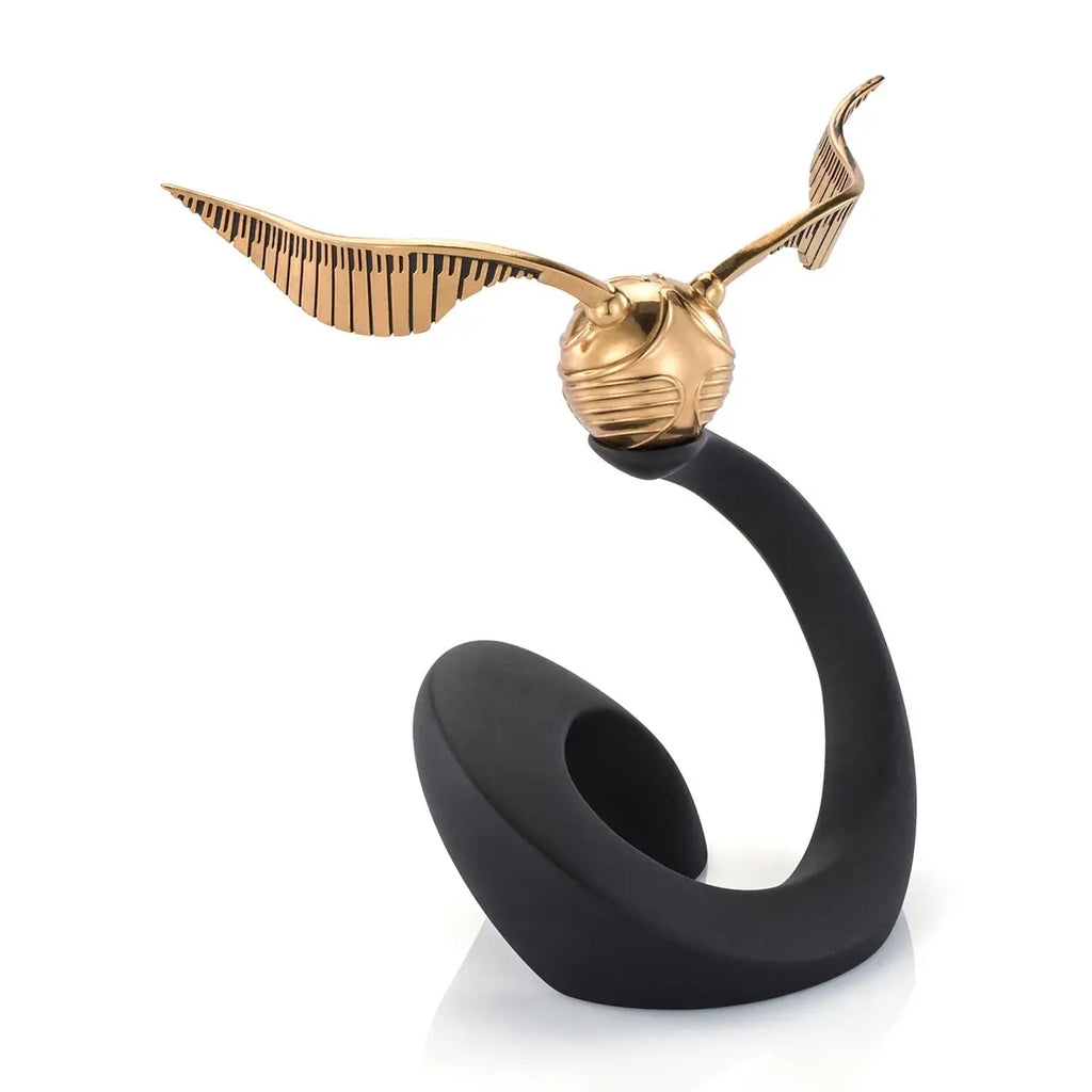 The Harry Potter Limited Edition Golden Snitch Replica features a golden winged ball on a sleek black curved stand, perfect for fans and collectors.
