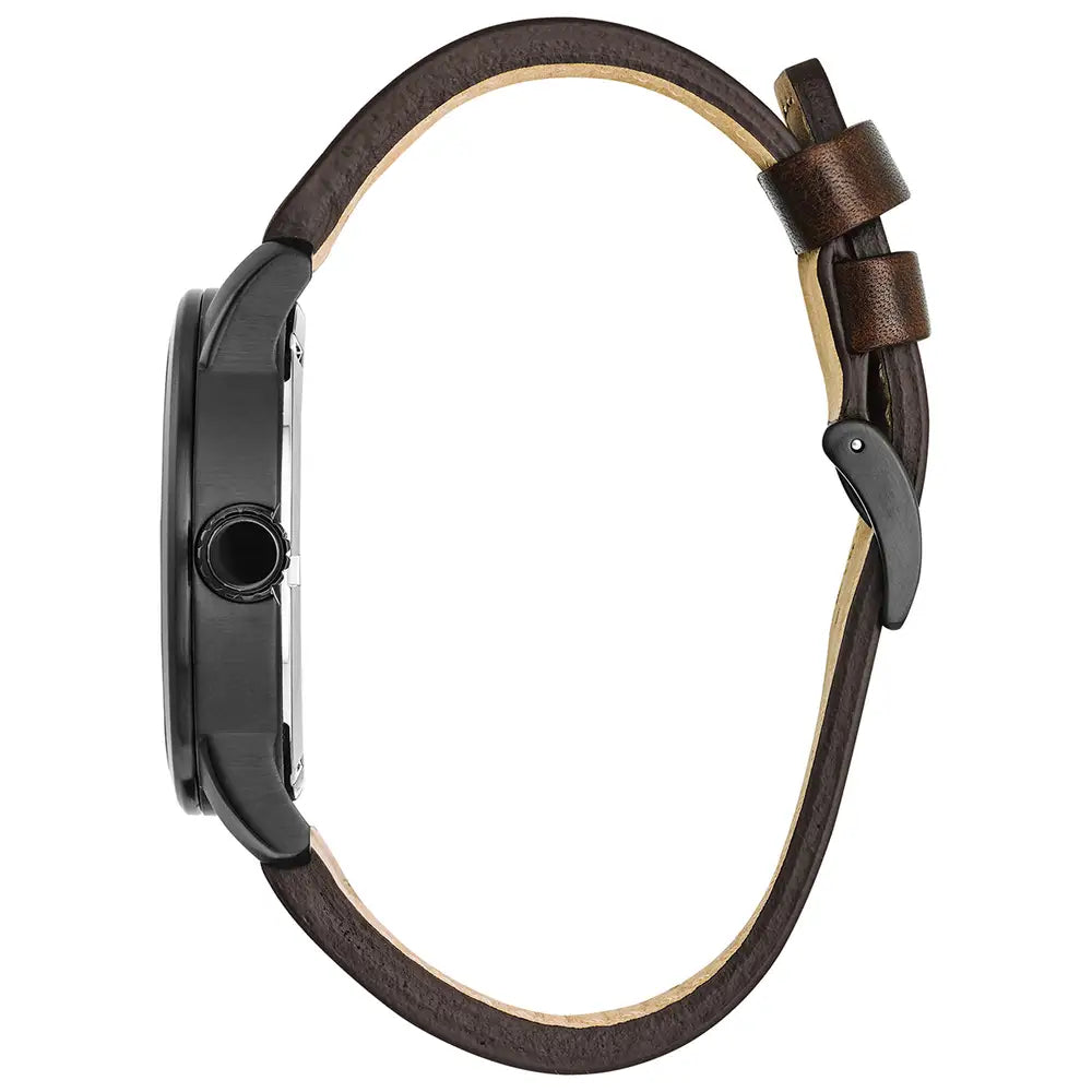 A side view of the Citizen Men's Eco-Drive Military Style Watch (BM8478-01L) featuring a black Ion Plated stainless steel case, brown leather strap with two securing loops, and visible crown.