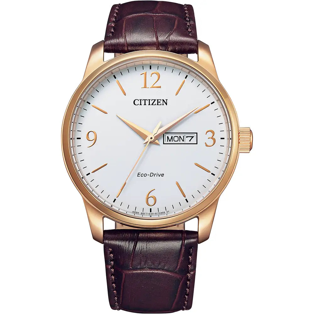 The Citizen Men's Eco-Drive Leather Strap Watch, model BM8553-16A, features a white dial, gold-tone case, brown leather strap, and day-date display at 3 o’clock, powered by reliable Eco-Drive technology.
