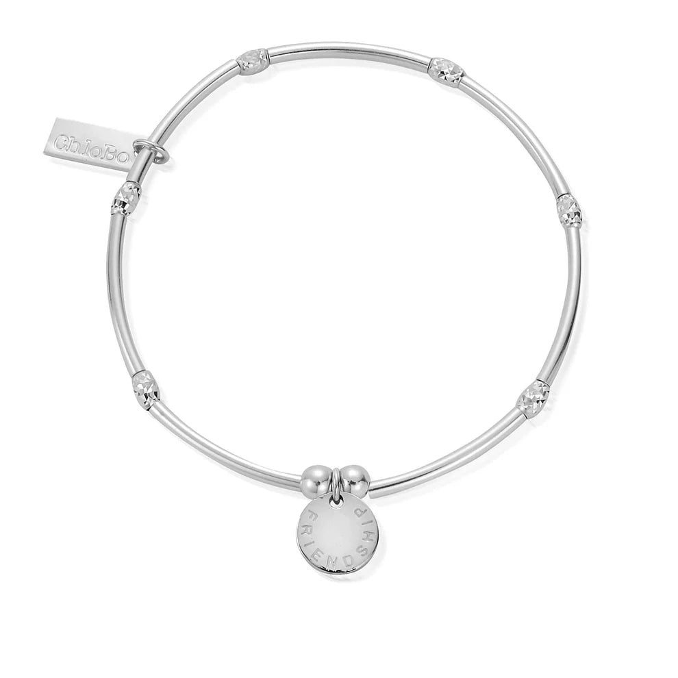 The ChloBo Personalised Mini Noodle Sparkle Rice Friendship Disc Bracelet features a thin silver bangle with round beads, a "FRIEND" charm, and a "chloBo" tag—a thoughtful personalized friendship gift.