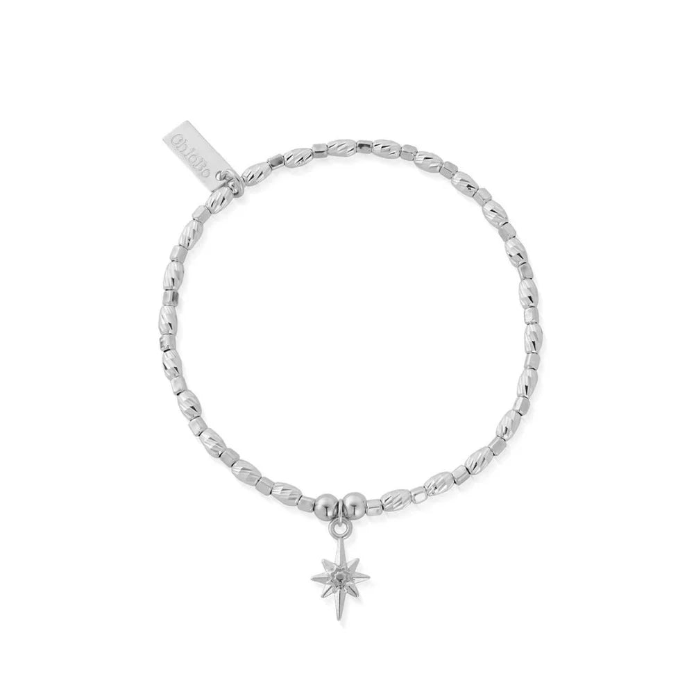 The ChloBo Soul Glow Lucky Star Bracelet features silver beads, a star-shaped charm, and an engraved tag—meaningful jewelry perfect for any occasion.