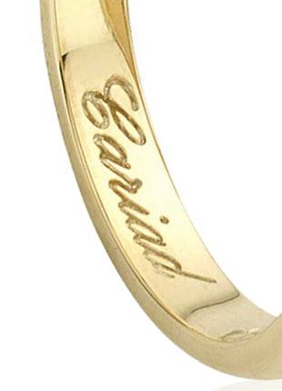 A Clogau 18ct Gold Welsh Wedding Ring – 3mm with a inscription on it.