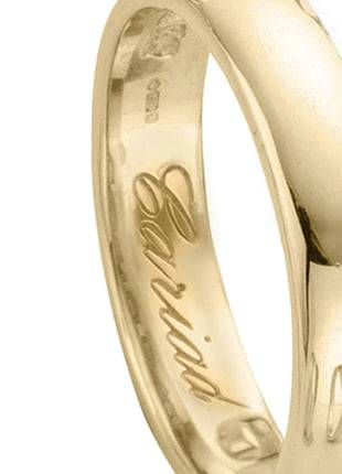 A close-up of a Clogau 18ct Gold Welsh Wedding Ring – 4mm.