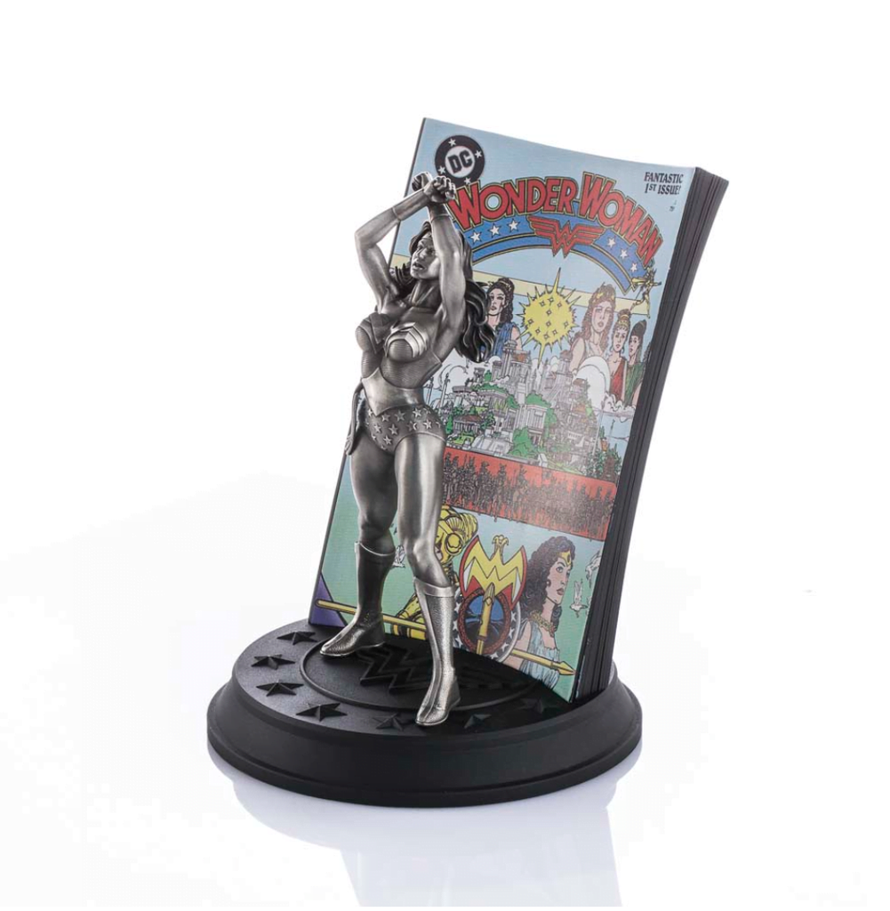 A statue of a woman holding Limited Edition Wonder Woman Volume 2 #1 0179029.
