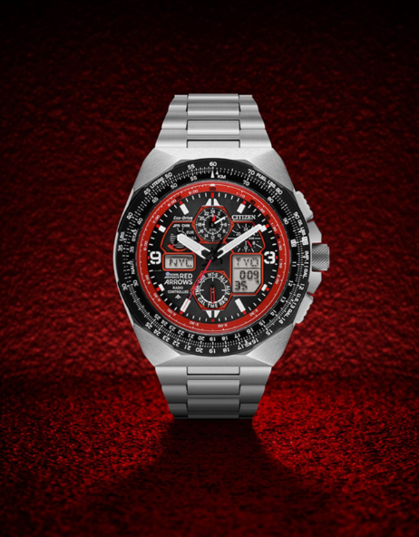 A silver and RED ARROWS LIMITED EDITION SKYHAWK A.T watch on a black background.