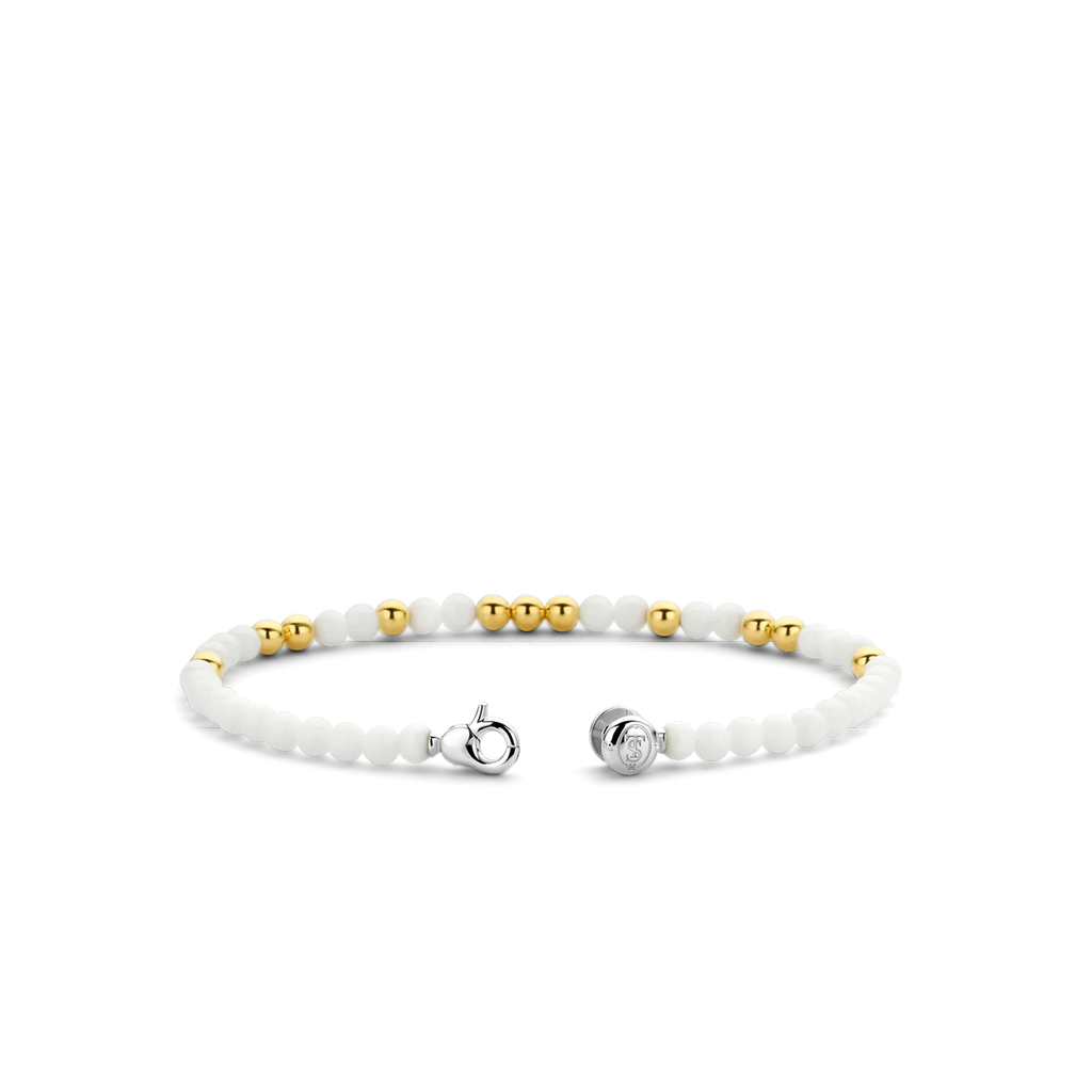 A white and gold TI SENTO – Milano Stacking Bracelet 2908WY beaded bracelet.