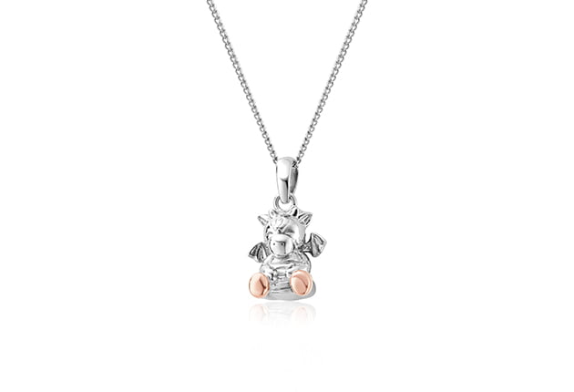 A silver and rose gold Clogau Ciwt Dragon pendant on a chain.