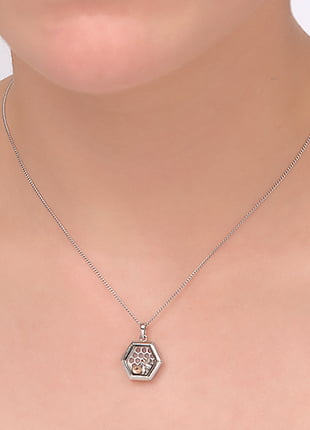 A woman wearing a necklace with a Clogau Honey Bee Inner Charm® Pendant 3SICLP11.