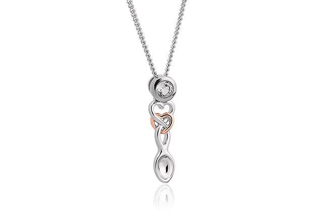 A silver and gold Clogau Lovespoon necklace with a heart and a diamond pendant.