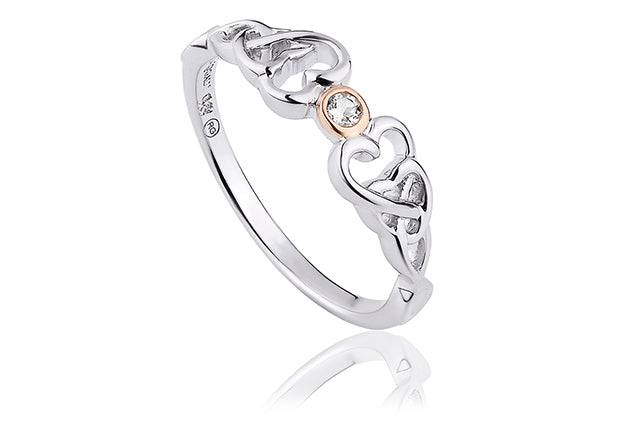 A Clogau Lovespoon Ring 3SLSR3 with a diamond in the center.