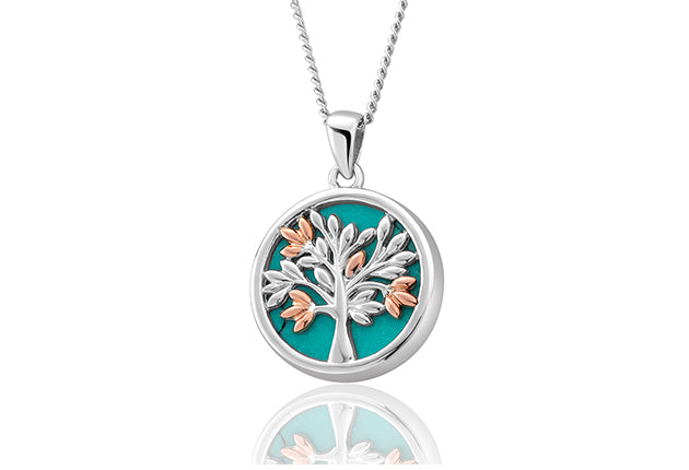 A CLOGAU Tree of Life Turquoise Pendant 3SNTLCTP with a tree of life on it.