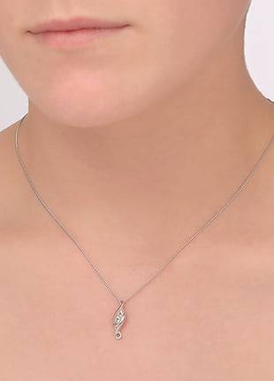 A woman wearing a necklace with a Clogau Past Present Future® Pendant. 3SPPFP.