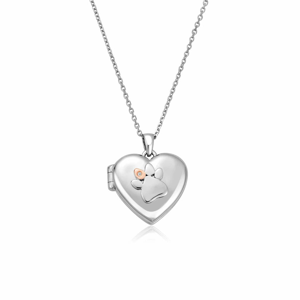 A Clogau Paw Print Heart Locket 3SPWP0617 with a paw print on it.