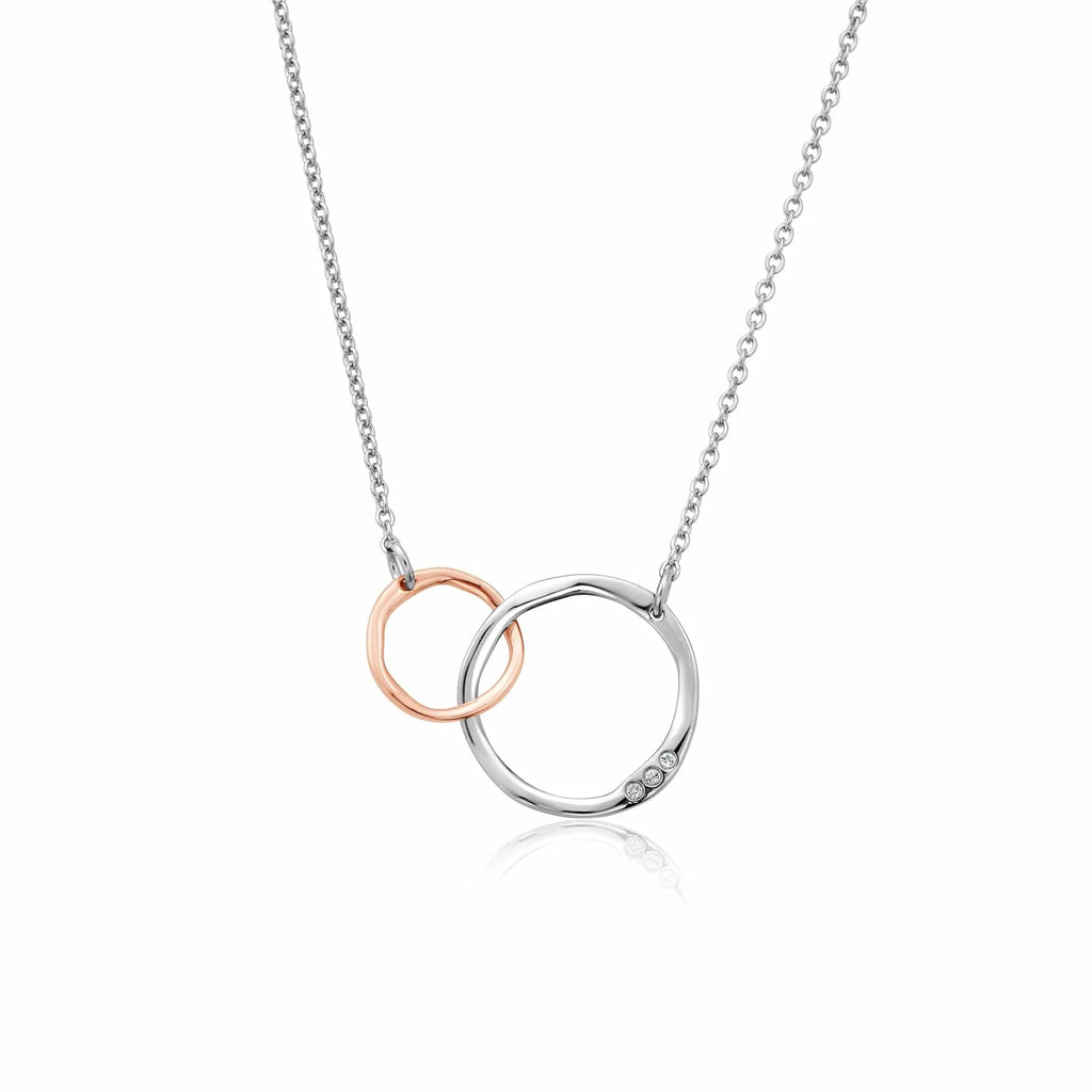 A Clogau Ripples Choker Necklace 3SRPP0601 with two circles on a silver and rose gold chain.